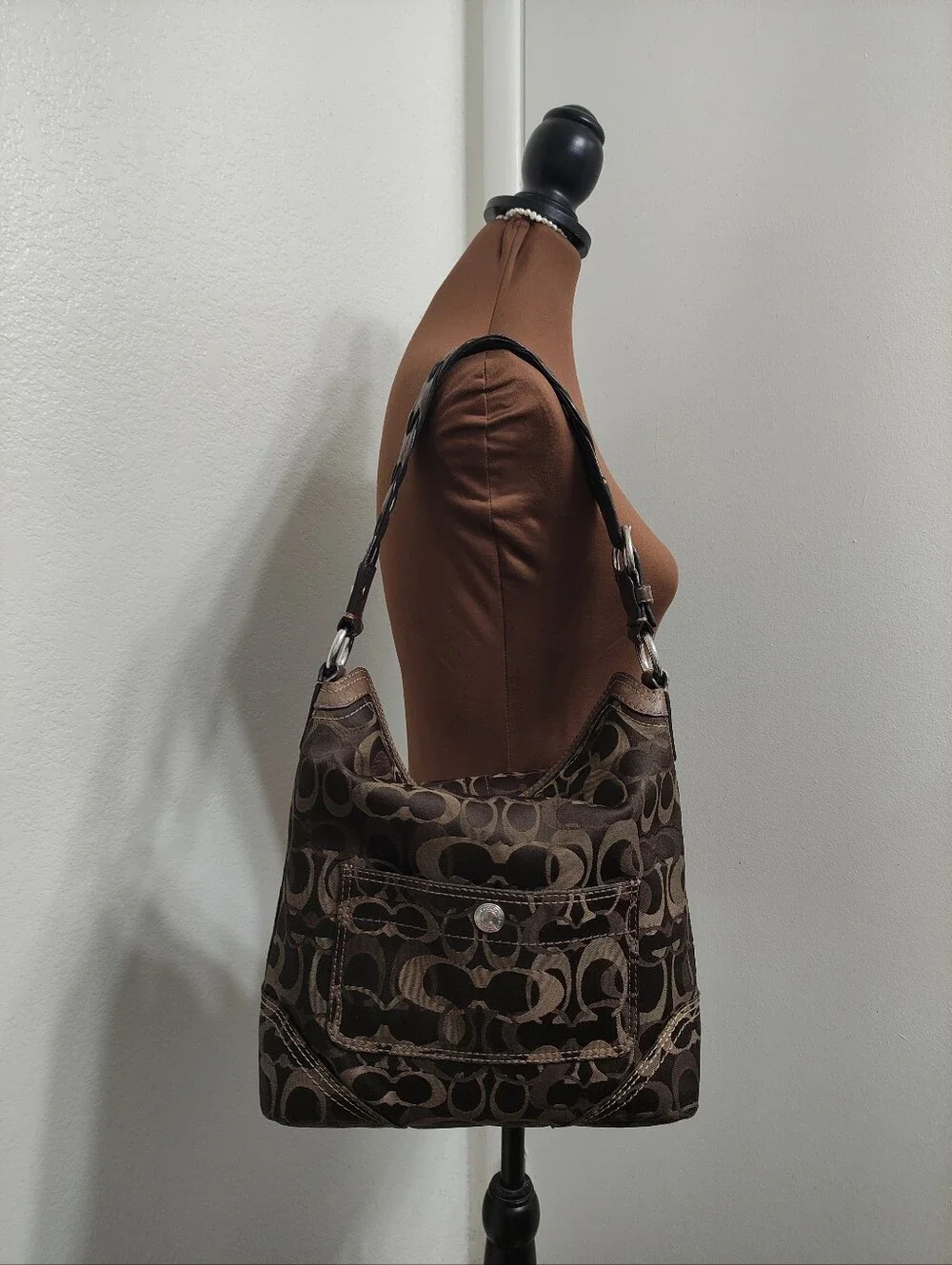 Coach signature fabric